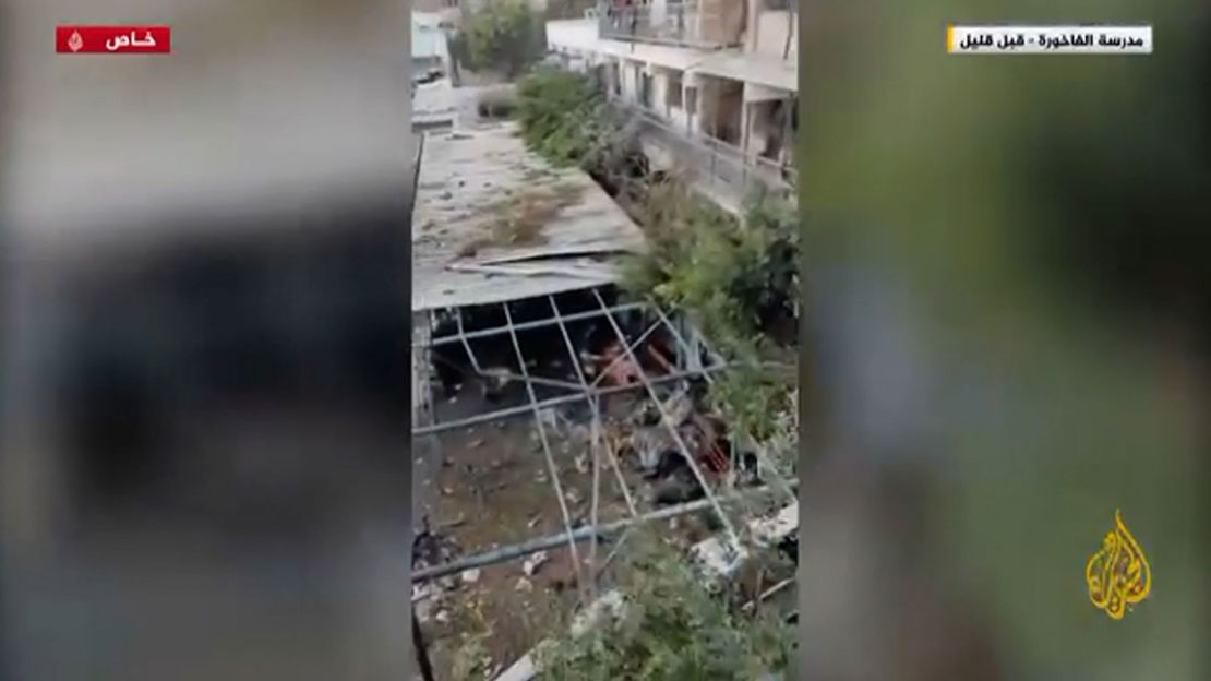 A still from video that first aired on Al Jazeera shows the aftermath at a UN school that was struck on Saturday. Al Jazeera did not report how they obtained the video.