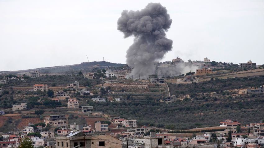 Black smoke rises from an Israeli airstrike on the outskirts of Aita al-Shaab, a Lebanese border village with Israel as it is seen from Rmeish village, in south Lebanon, Monday, Nov. 13, 2023. Israeli troops and Hezbollah militants and their allies have been clashing along the border since the Israel-Hamas war started five weeks ago with a bloody incursion into southern Israel by Hezbollah ally Hamas.