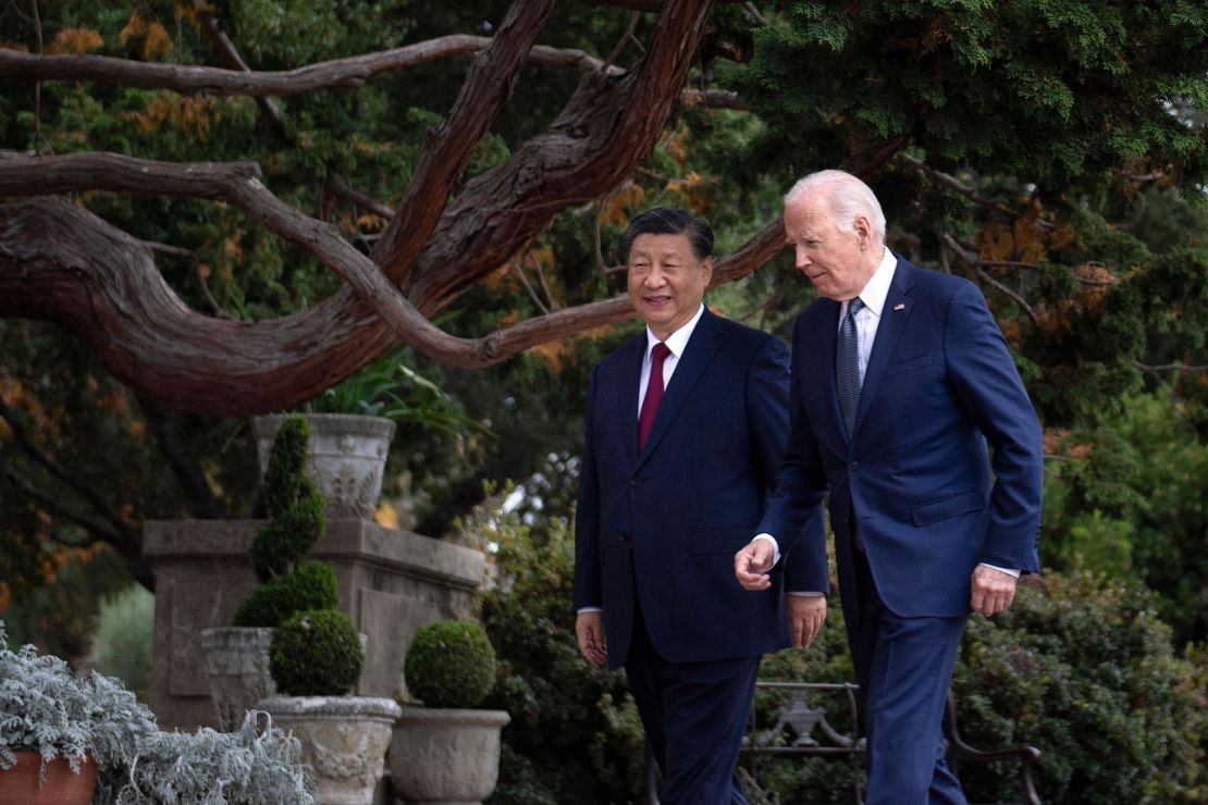 US President Joe Biden (R) and Chinese President Xi Jinping walk together after a meeting during the Asia-Pacific Economic Cooperation (APEC) Leaders' week in Woodside, California on November 15, 2023. Biden and Xi will try to prevent the superpowers' rivalry spilling into conflict when they meet for the first time in a year at a high-stakes summit in San Francisco on Wednesday. With tensions soaring over issues including Taiwan, sanctions and trade, the leaders of the world's largest economies are expected to hold at least three hours of talks at the Filoli country estate on the city's outskirts. (Photo by Brendan Smialowski / AFP) (Photo by BRENDAN SMIALOWSKI/AFP via Getty Images)