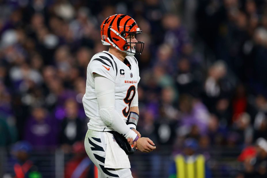 Cincinnati Bengals quarterback Joe Burrow holds his wrist after a throw during the Bengals' 34-20 Thursday Night Football loss to the Baltimore Ravens on November 16. He tore a ligament in his right wrist.