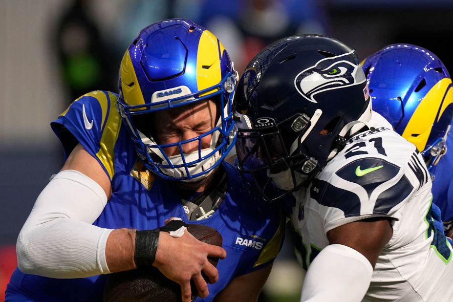 Seattle Seahawks cornerback Devon Witherspoon sacks Los Angeles Rams quarterback Matthew Stafford. The Seahawks beat the Rams 17-16.