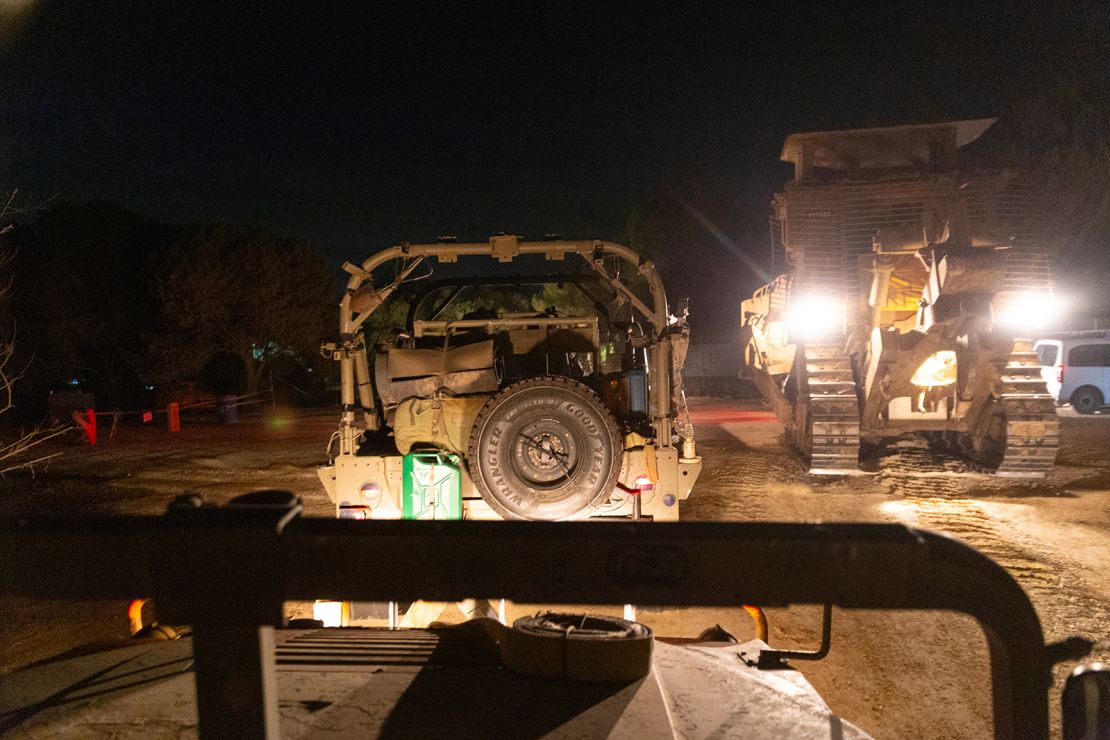 Soon after crossing the border into Gaza, the convoy of Humvees turned off its lights and traveled in darkness.