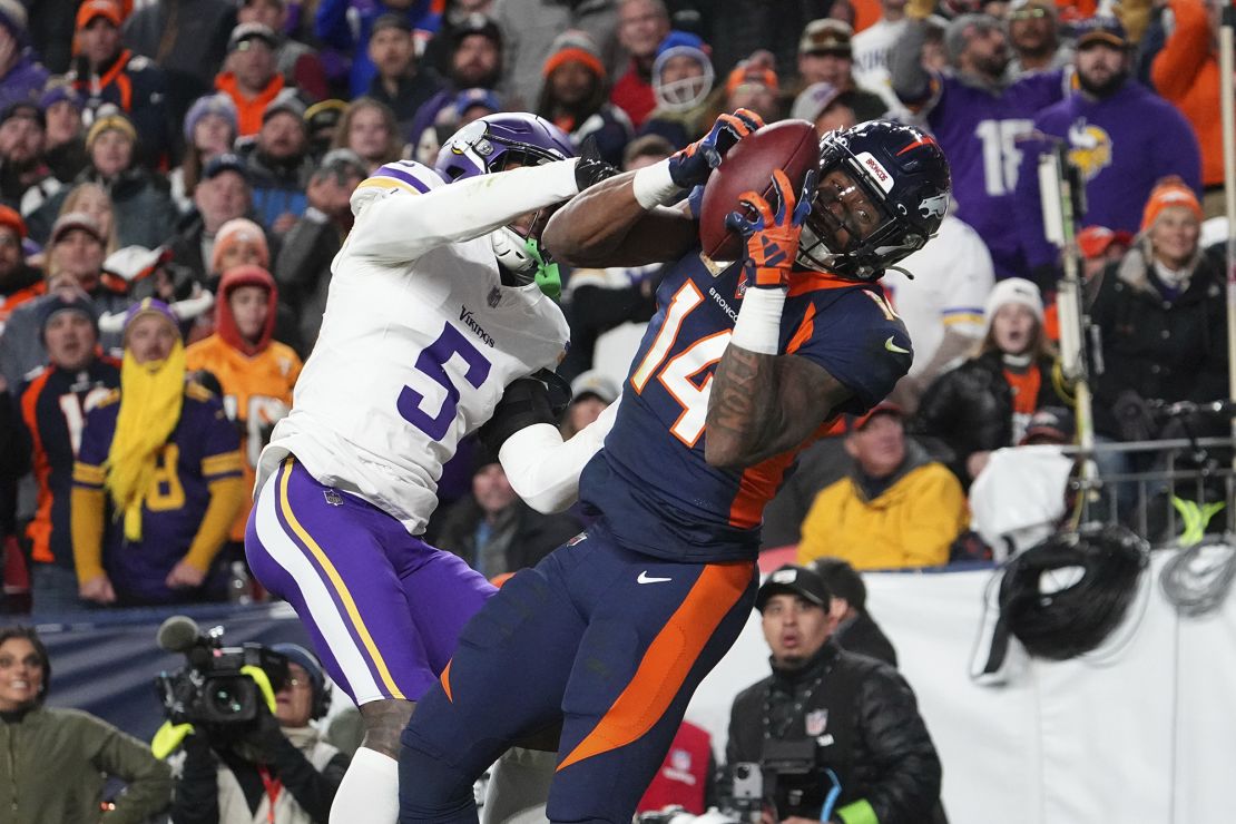 Denver Broncos wide receiver Courtland Sutton (14) celebrates the game winning touchdown against the Minnesota Vikings of an NFL football game Sunday November 19, 2023, in Denver. (AP Photo/Bart Young)