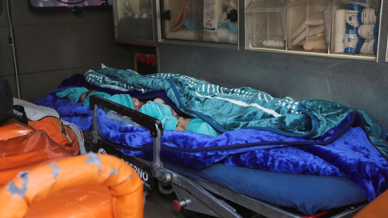 Premature babies, who were evacuated from Al Shifa hospital, lie in an ambulance before they are transported for treatment in UAE, at Rafah border crossing with Egypt, in Rafah, in the southern Gaza Strip, November 20, 2023. REUTERS/Hatem Khaled