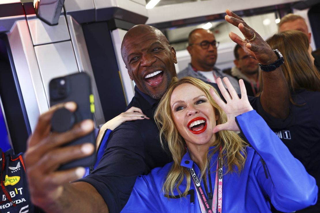LAS VEGAS, NEVADA - NOVEMBER 18: Terry Crews and Kylie Minogue look on prior to the F1 Grand Prix of Las Vegas at Las Vegas Strip Circuit on November 18, 2023 in Las Vegas, Nevada. (Photo by Mark Thompson/Getty Images)