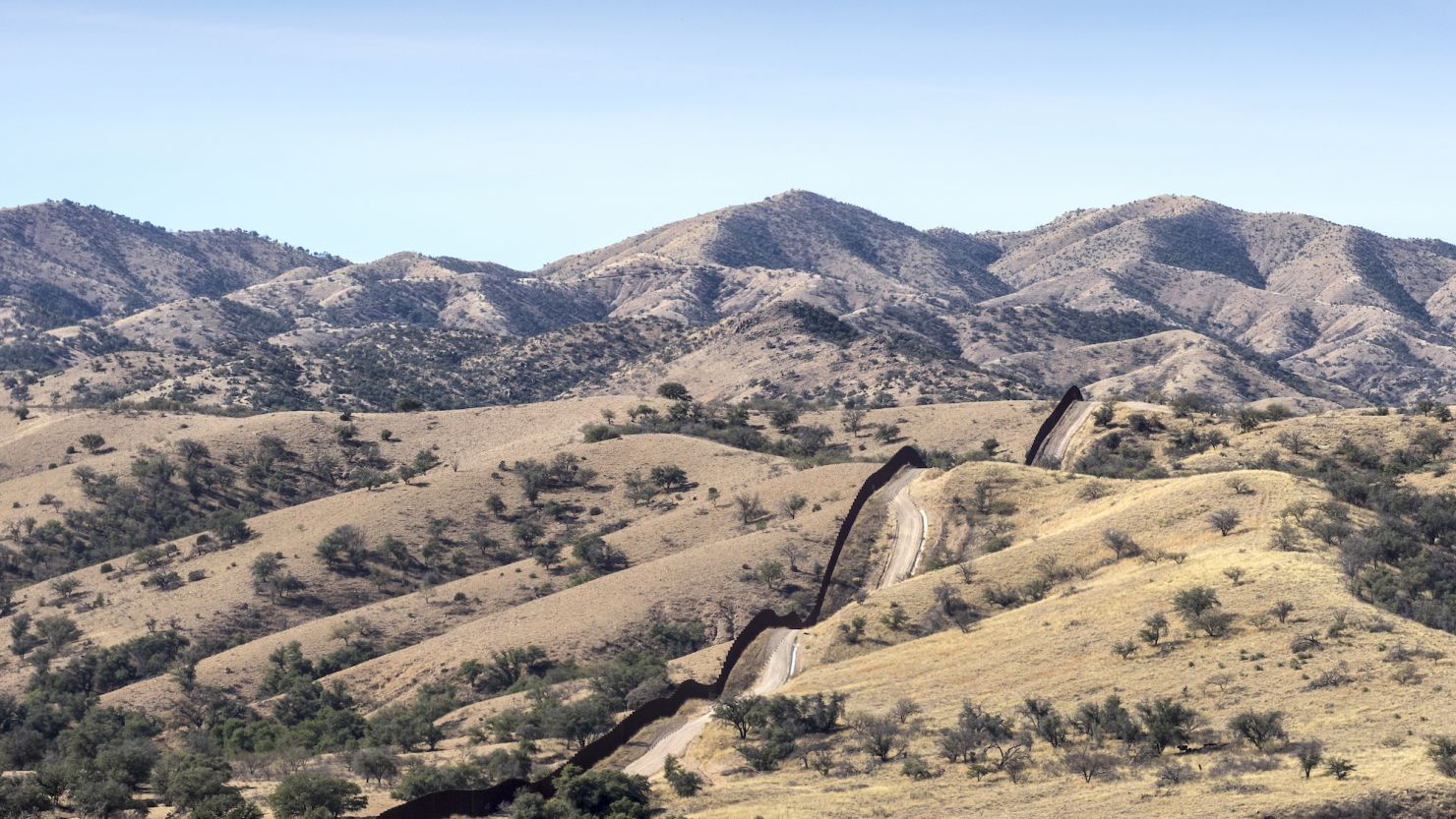 NOGALES, AZ - JANUARY 21:  The U.S.-Mexico border fence stretches into the countryside on January 21, 2014 near Nogales, Arizona.  (Photograph by Charles Ommanney/Reportage by Getty Images)
