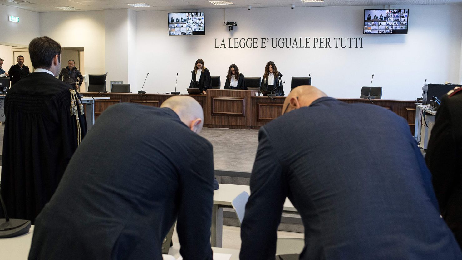 Magistrates stand during the reading of the verdict at the maxi mafia-trial in Lamezia Terme on November 20, 2023 where some 200 people were convicted in the so-called Rinascita Scott trial against alleged members of the 'Ndrangheta mafia in the Calabrian province of Vibo Valentia and the mob's white-collar facilitators. (Photo by Gianluca CHININEA / AFP) (Photo by GIANLUCA CHININEA/AFP via Getty Images)