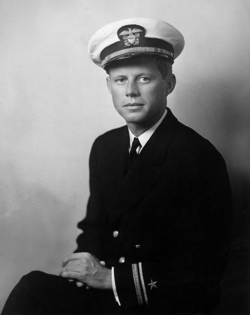 Kennedy poses for a portrait in his US Navy uniform. He joined the US Naval Reserve in 1941 and was awarded the Navy and Marine Corps Medal for his courage as commander of the torpedo boat <a href="https://www.cnn.com/2023/08/03/australia/caroline-kennedy-jfk-world-war-ii-swim-intl-hnk/index.html" target="_blank">PT-109. </a>