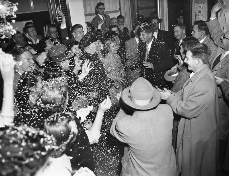 Kennedy is showered with confetti by his Boston campaign staff during his campaign for a US Senate seat in November 1952. He defeated three-term incumbent Henry Cabot Lodge Jr. 