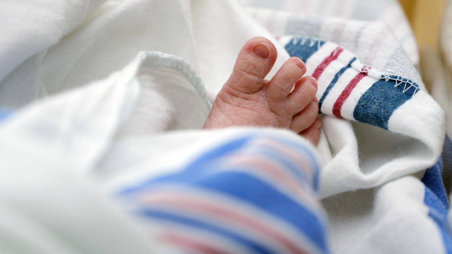 FILE - The toes of a baby peek out of a blanket at a hospital in McAllen, Texas. On Wednesday, Nov. 1, 2023, the Centers for Disease Control and Prevention reported the increase of U.S. infant mortality rate to 3% in 2022 — a rare increase in a death statistic that has been generally been falling for decades. (AP Photo/Eric Gay, File)