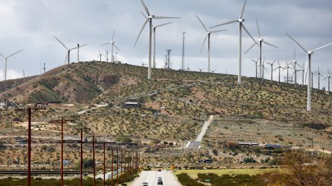 WHITEWATER, CALIFORNIA - FEBRUARY 22: Wind turbines operate at a wind farm, a key power source for the Coachella Valley, as vehicles drive on February 22, 2023 near Whitewater, California. Wind turbines in California provide enough energy to power more than 2 million homes while the International Energy Agency (IEA) predicts renewable energy will account for 35 percent of worldwide power generation in 2025. (Photo by Mario Tama/Getty Images)