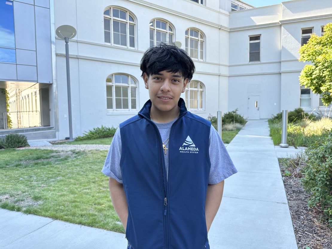 Javier Velasquez Lopez interned at Wilma Chan Highland Hospital Campus after gunmen stormed his East Oakland High School last year. Velasquez Lopez says many people he knows own guns because Oakland doesn't feel safe to them. (Samantha Young/KFF Health News)