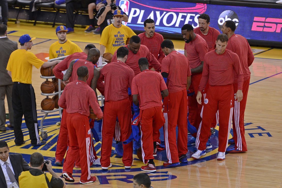 Los Angeles Clippers remove their warm up jackets and wear their shirts inside-out as a sign of protest over the alleged racist remarks made by their owner Donald Sterling before playing the Golden State Warriors in Game 4 of their Western Conference NBA playoff at Oracle Arena in Oakland, Calif., on Sunday, April 27, 2014. (Jose Carlos Fajardo/Bay Area News Group) (Photo by MediaNews Group/Bay Area News via Getty Images)