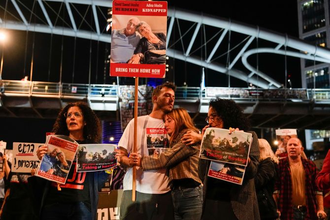 Families and friends of hostages held in Gaza call for Israeli Prime Minister Benjamin Netanyahu to bring them home, during a demonstration in Tel Aviv on Tuesday, November 21.