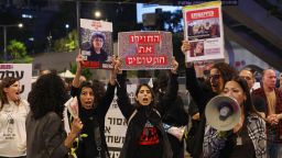 Families and friends of hostages held in Gaza call for Israeli Prime Minister Benjamin Netanyahu to bring them home, during a demonstration in Tel Aviv on November 21, 2023.