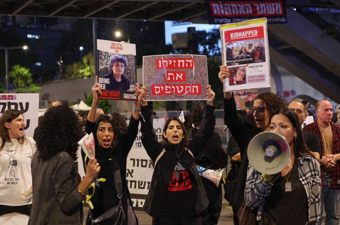 Families and friends of hostages held in Gaza call for Israeli Prime Minister Benjamin Netanyahu to bring them home, during a demonstration in Tel Aviv on November 21, 2023.