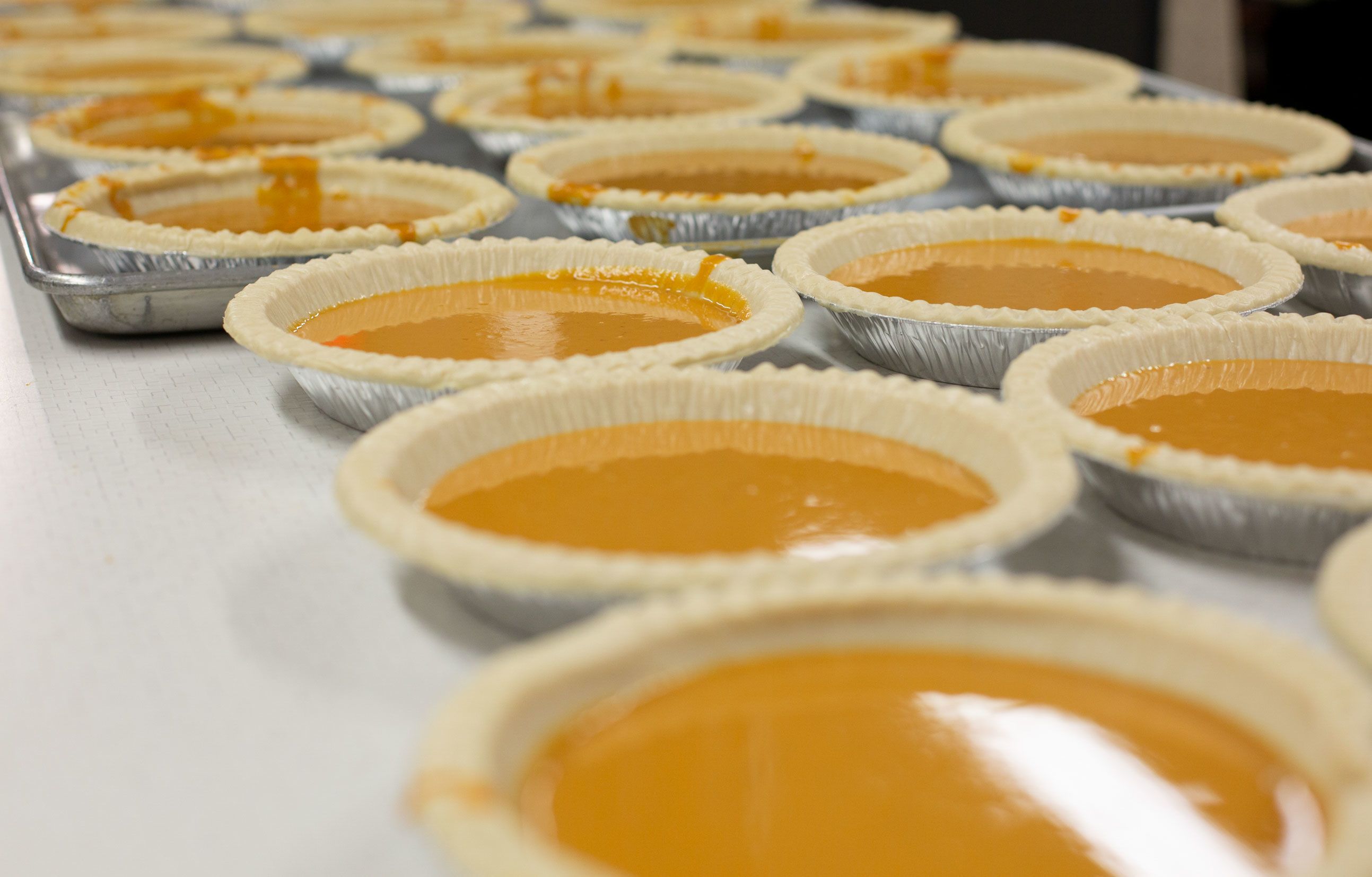 Pies are seen before getting baked at Robert F. Wagner Middle School in New York City, on November 18.