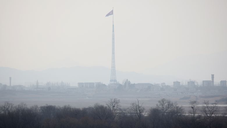 A North Korean flag flutters at the propaganda village of Gijungdong in North Korea, in this picture taken near the truce village of Panmunjom inside the demilitarized zone (DMZ) separating the two Koreas, South Korea, February 7, 2023.   REUTERS/Kim Hong-Ji