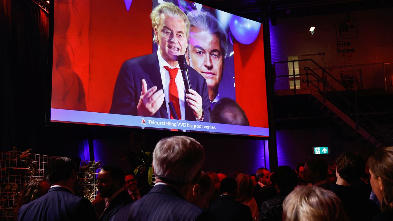 Dutch far-right politician and leader of the PVV party Geert Wilders appears on a screen as supporters of Dilan Yesilgoz, the leader of VVD, gather for exit poll and early results in the Dutch parliamentary elections, in The Hague, Netherlands, November 22, 2023. REUTERS/Piroschka van de Wouw