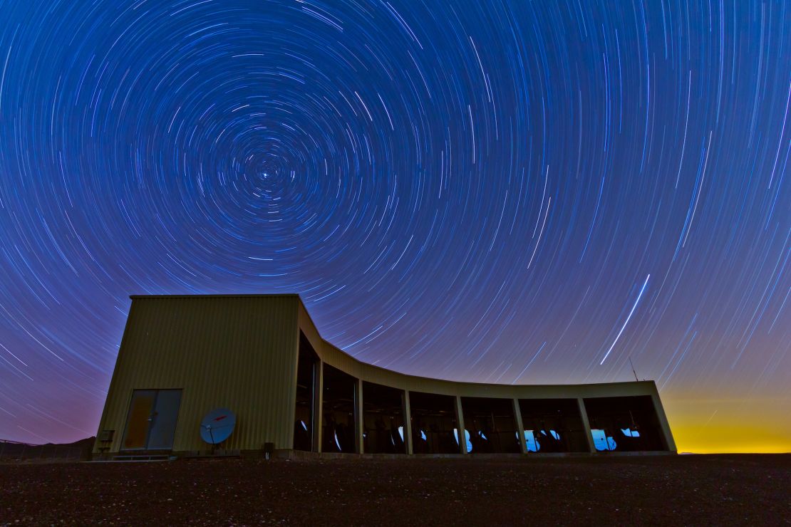Extended time exposure of Telescope Station at Middle Drum with stars swirling overhead.
