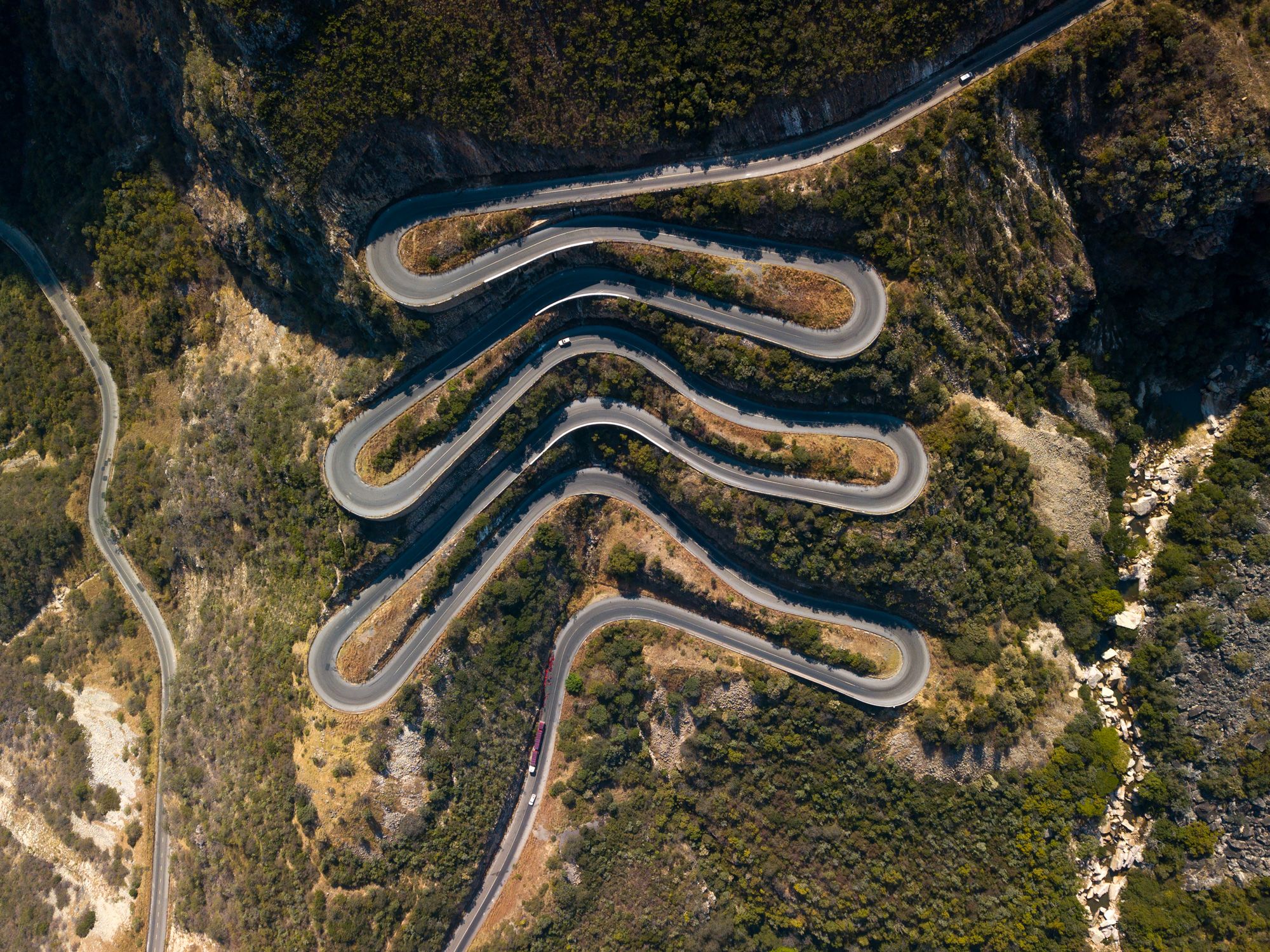 HUMPATA, ANGOLA - JULY 16: Aerial view of the the road at Serra da Leba, Huila Province, Humpata, Angola on July 16, 2018 in Humpata, Angola. (Photo by Eric Lafforgue/Art In All Of Us/Corbis via Getty Images)