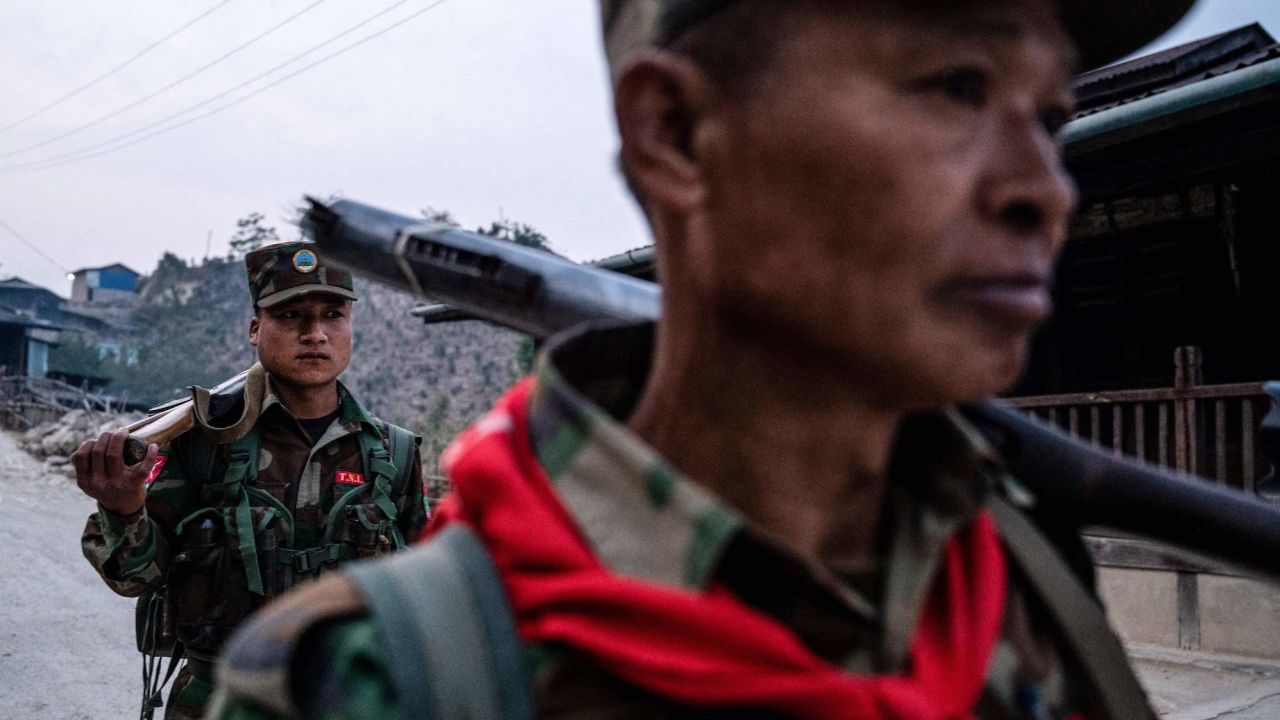 In this photo taken on March 9, 2023 members of ethnic rebel group Ta'ang National Liberation Army (TNLA) patrol near Namhsan Township in Myanmar's northern Shan State. (Photo by AFP) (Photo by STR/AFP via Getty Images)