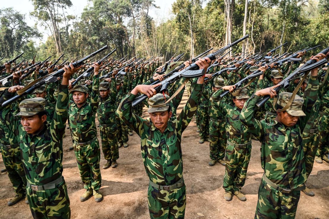 In this photo taken on March 8, 2023 members of ethnic rebel group Ta'ang National Liberation Army (TNLA) take part in a training exercise at their base camp in the forest in Myanmar's northern Shan State. (Photo by AFP) (Photo by STR/AFP via Getty Images)