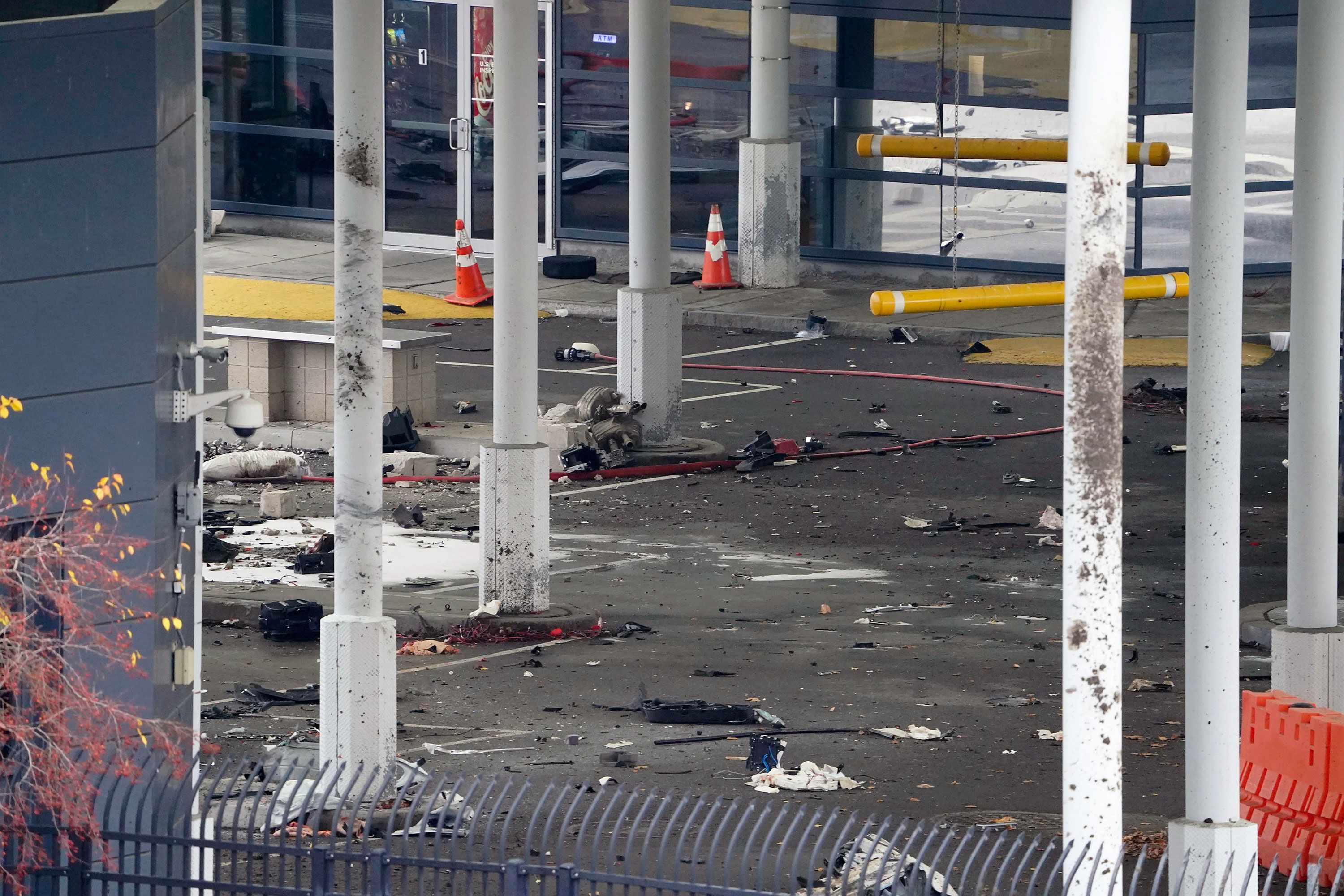 Debris is scattered at the Rainbow Bridge border crossing after a deadly car crash.