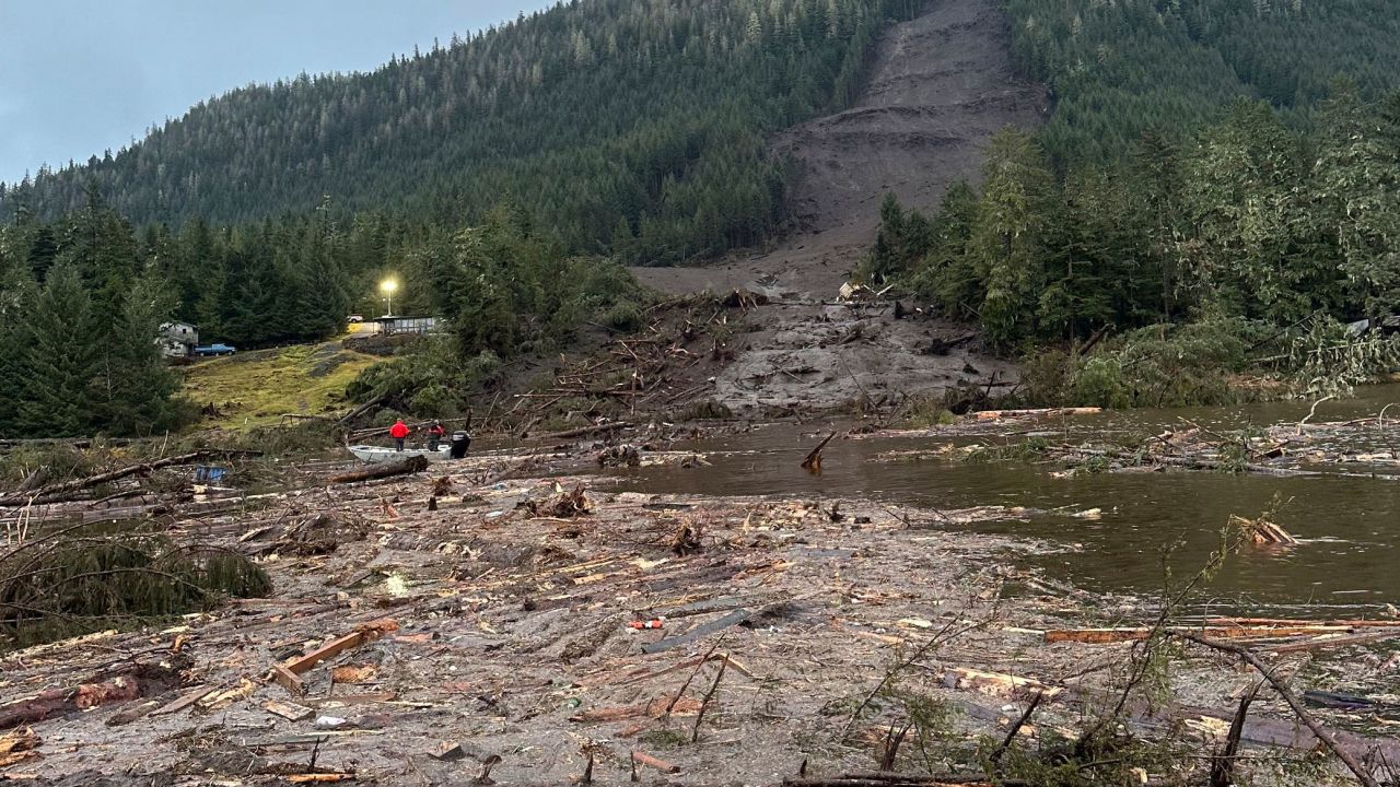 This photo provided by the Alaska Department of Public Safety shows debris from a massive landslide extends into the sea at mile 11 of the Zimovia Highway on Wednesday, Nov. 22, 2023, in Wrangell, Alaska. Three people have died and searchers looked Wednesday for three others who remain missing after a landslide ripped through a remote Alaska fishing community on Monday, Nov. 20, 2023. (Alaska Department of Public Safety via AP)