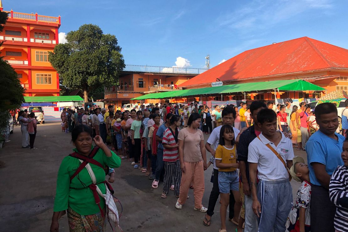 People queue for food at a monastery-turned-temporary shelter for internally displaced people (IDP) in Lashio, Shan state on November 15, 2023. Fighting has raged across Myanmar's northern Shan state for more than two weeks after an alliance of ethnic minority groups launched a surprise offensive against the military. (Photo by STRINGER / AFP) (Photo by STRINGER/AFP via Getty Images)