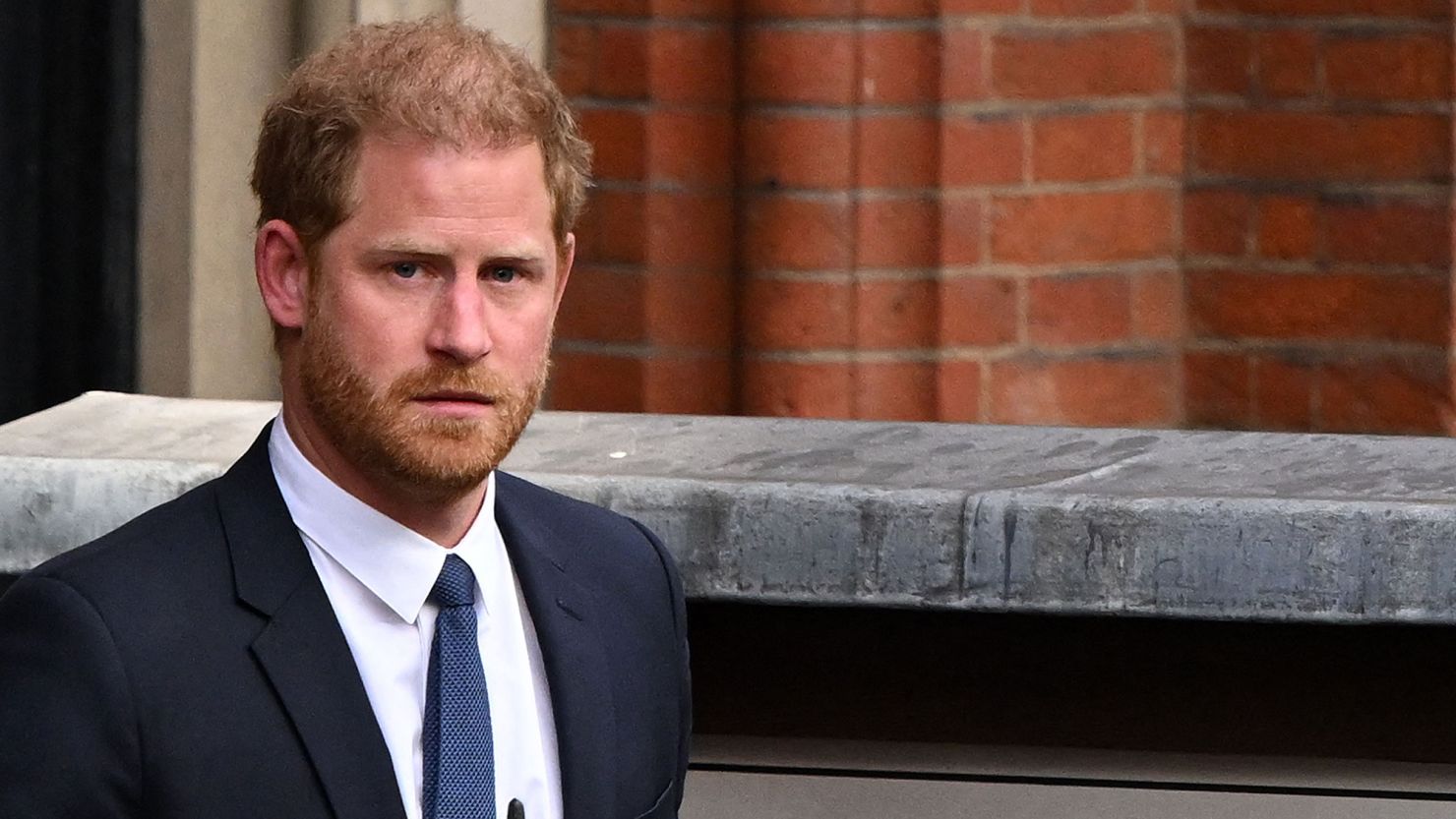 Britain's Prince Harry, Duke of Sussex leaves from the Royal Courts of Justice, Britain's High Court, in central London on March 27, 2023. - Prince Harry and pop superstar Elton John appeared at a London court Monday, delivering a high-profile jolt to a privacy claim launched by celebrities and other figures against a newspaper publisher. The publisher of the Daily Mail, Associated Newspapers (ANL), is trying to end the high court claims brought over alleged unlawful activity at its titles. (Photo by JUSTIN TALLIS / AFP) (Photo by JUSTIN TALLIS/AFP via Getty Images)