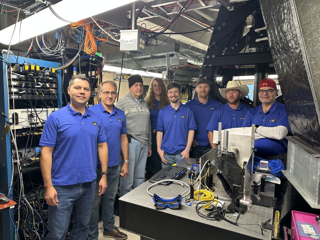 DSOC ground laser transmitter operators pose for a photo at the Optical Communications Telescope Laboratory at JPL's Table Mountain Facility near Wrightwood, California, shortly after the technology demonstration achieved "first light" on November 14.