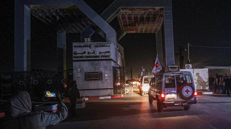 International Red Cross vehicles transport freed hostages through the Rafah border crossing in Gaza on Friday, November 24. <a href="https://www.cnn.com/2023/11/24/middleeast/israel-hamas-hostage-release-deal-intl" target="_blank">Twenty-four people held hostage for nearly seven weeks in the Gaza Strip were released Friday</a> as part of a truce brokered between Israel and Hamas, according to officials. The group included 10 Thai citizens, 13 Israelis and one Philippine citizen, according to Qatar's Foreign Ministry spokesperson Majed Al-Ansari.