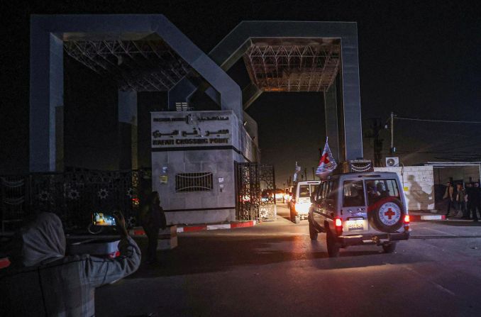 International Red Cross vehicles transport freed hostages through the Rafah border crossing in Gaza on November 24. <a href="index.php?page=&url=https%3A%2F%2Fwww.cnn.com%2F2023%2F11%2F24%2Fmiddleeast%2Fisrael-hamas-hostage-release-deal-intl" target="_blank">Twenty-four people held hostage for nearly seven weeks in the Gaza Strip were released Friday</a> as part of a truce brokered between Israel and Hamas, according to officials. The group included 10 Thai citizens, 13 Israelis and one Philippine citizen, according to Qatar's Foreign Ministry spokesperson Majed Al-Ansari.