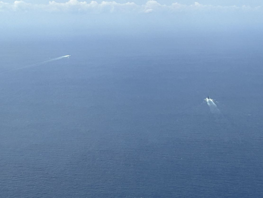 Long wakes visible from the air are often the first sign of warships spotted by the crew of a Canadian helicopter over the East China Sea.