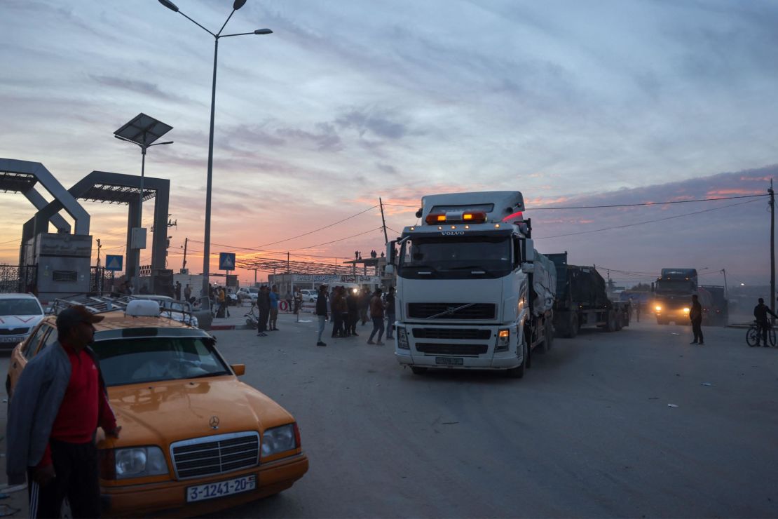 Trucks carrying humanitarian aid enter southern Gaza through the Rafah crossing on November 25.