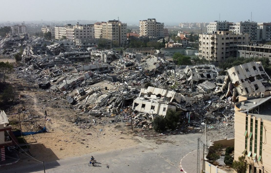 Residential buildings, destroyed in Israeli strikes during the conflict, lie in ruin, amid a temporary truce between Israel and the Palestinian Islamist group Hamas, in southern Gaza City November 26, 2023.