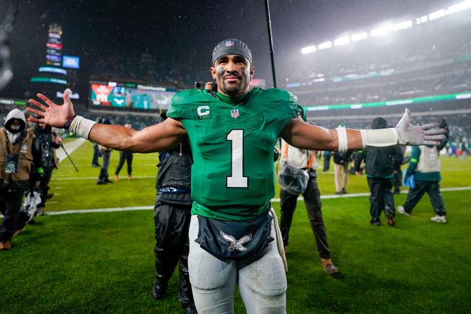 Philadelphia Eagles quarterback Jalen Hurts celebrates after scoring the game winning touchdown against the Buffalo Bills in overtime on Sunday, November 26. The Eagles won 37-34.