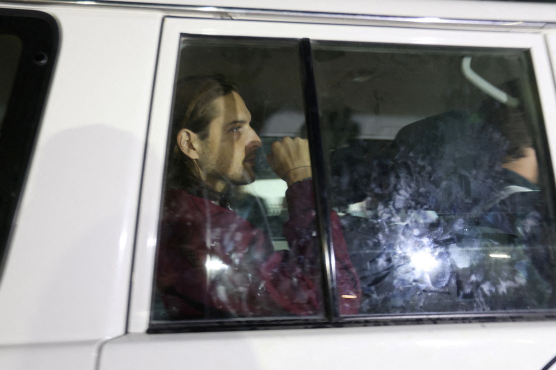 Hostage Roni Kriboy, 25, abducted by Hamas militants during the October 7 attack on Israel, arrives at the Rafah border, amid a hostages-prisoners swap deal between Hamas and Israel, in the southern Gaza Strip November 26, 2023. REUTERS/Ibraheem Abu Mustafa