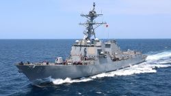 The U.S. Navy guided-missile destroyer USS Mason pulls alongside a fleet