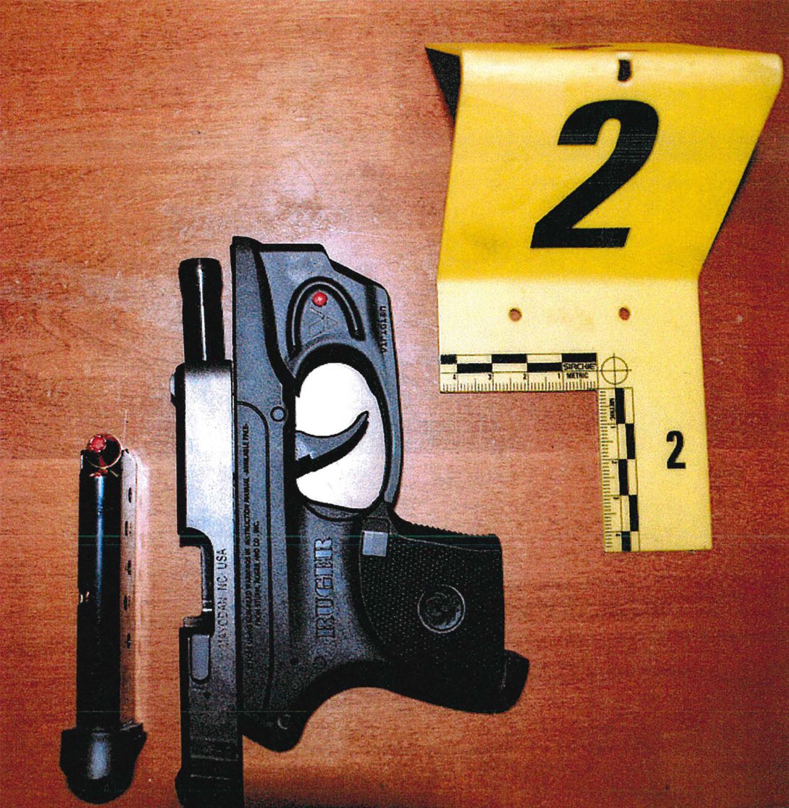Pistol and loaded magazine seized by Burlington Police Department from Eaton's bedroom.