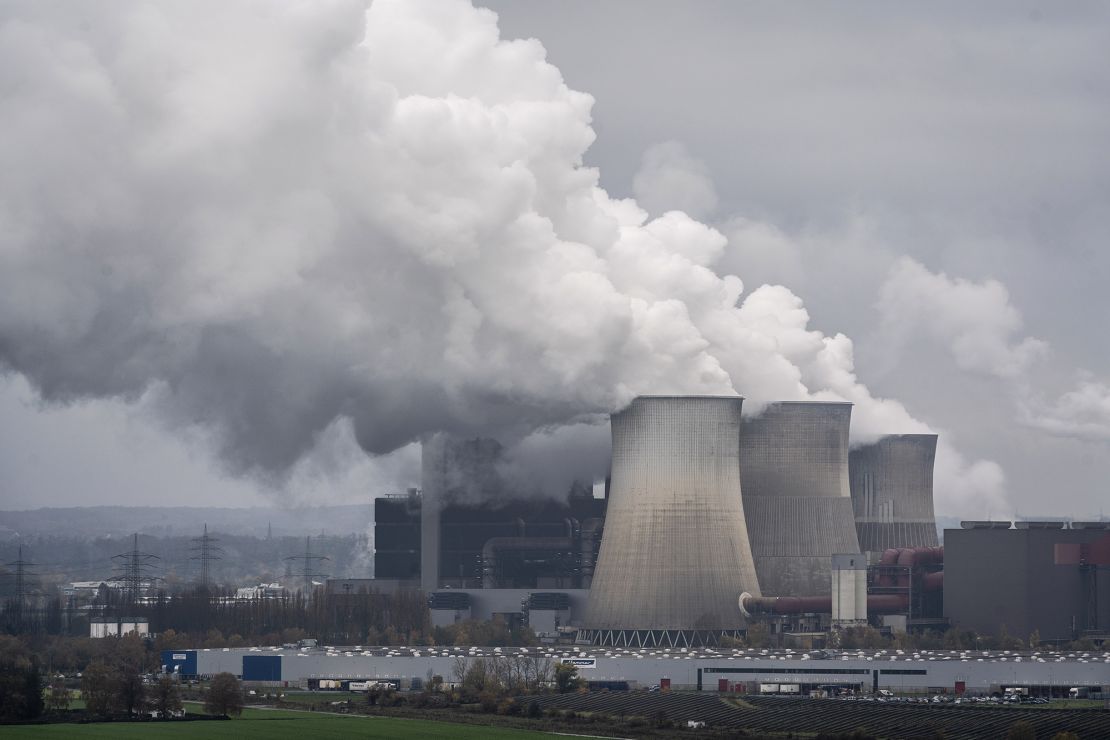 ESCHWEILER, GERMANY - NOVEMBER 17: Water vapour rises from cooling towers of the Weisweiler coal-fired power plant on November 17, 2023 near Eschweiler, Germany. Demands are rising that countries participating in the upcoming UNFCCC COP28 climate conference in Dubai agree on a roadmap for phasing out the use of fossil fuels. Meanwhile the United States and China have agreed to triple global renewable energy production by 2030, raising hope that real progress on mitigating climate change will be possible at COP28. (Photo by Bernd Lauter/Getty Images)