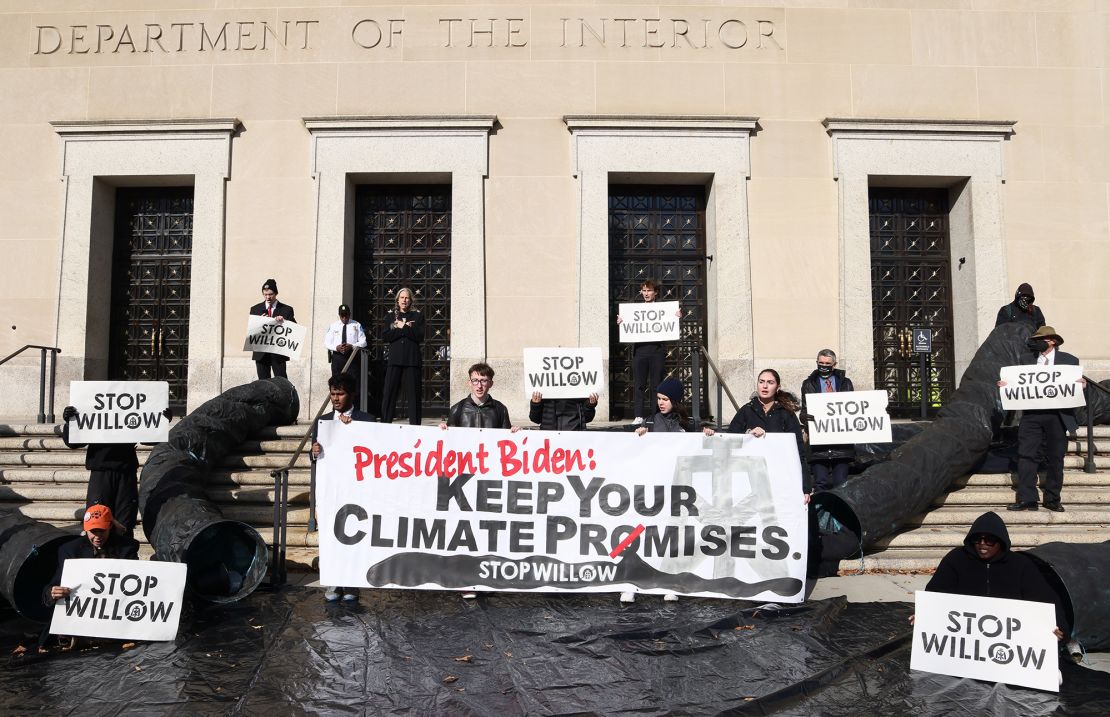 WASHINGTON, DC - NOVEMBER 17: Climate activist hold a demonstration to urge President Biden to reject the Willow Project at the US Department of Interior on November 17, 2022 in Washington, DC. (Photo by Jemal Countess/Getty Images for Sunrise AU)