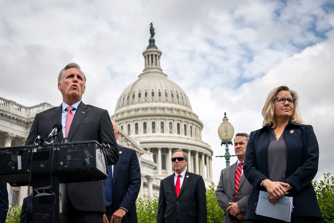 WASHINGTON, DC - MAY 27: At right, Rep. Liz Cheney (R-WY) stands with House Minority Leader Rep. Kevin McCarthy (R-CA) as he speaks during a news conference outside the U.S. Capitol, on May 27, 2020 in Washington, DC. Calling it unconstitutional, Republican leaders have filed a lawsuit against House Speaker Nancy Pelosi and congressional officials in an effort to block the House of Representatives from using a proxy voting system to allow for remote voting during the coronavirus pandemic. (Photo by Drew Angerer/Getty Images)
