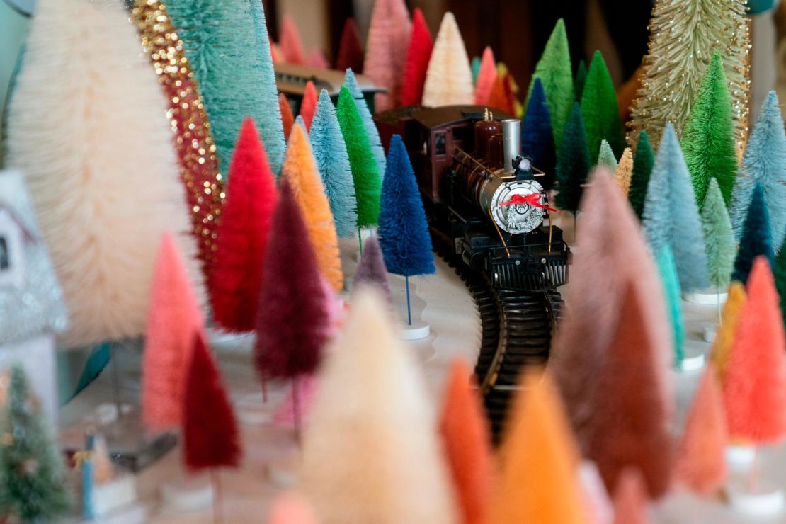 Holiday decorations adorn the Blue Room of the White House for the 2023 theme "Magic, Wonder, and Joy," Monday, Nov. 27, 2023, in Washington. (AP Photo/Evan Vucci)