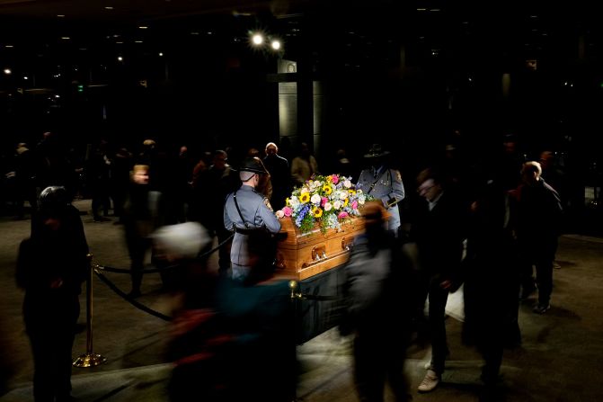 Members of the public pay their respects to the former first lady on Monday as she lies in repose at the Jimmy Carter Presidential Library and Museum.