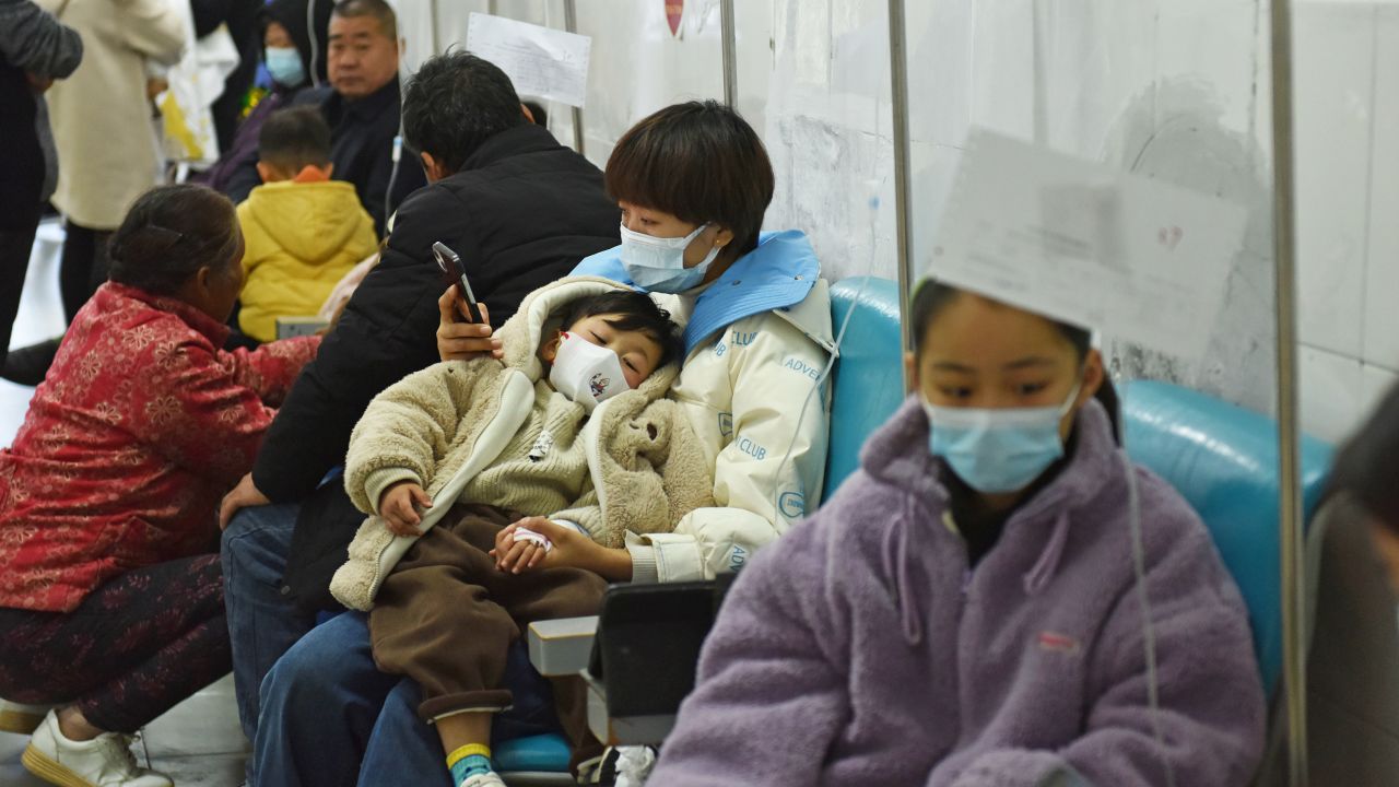 Sick children, accompanied by their parents, are receiving infusion treatment at the Department of Pediatrics of the People's Hospital in Fuyang, China, on November 28, 2023. (Photo by Costfoto/NurPhoto via Getty Images)