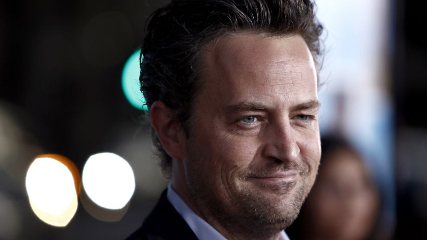 FILE - Matthew Perry arrives at the premiere of "The Invention of Lying" in Los Angeles on Monday, Sept. 21, 2009. Perry, who starred as Chandler Bing in the hit series "Friends," has died. He was 54. The Emmy-nominated actor was found dead of an apparent drowning at his Los Angeles home on Saturday, according to the Los Angeles Times and celebrity website TMZ, which was the first to report the news. Both outlets cited unnamed sources confirming Perry's death. His publicists and other representatives did not immediately return messages seeking comment. (AP Photo/Matt Sayles, File)