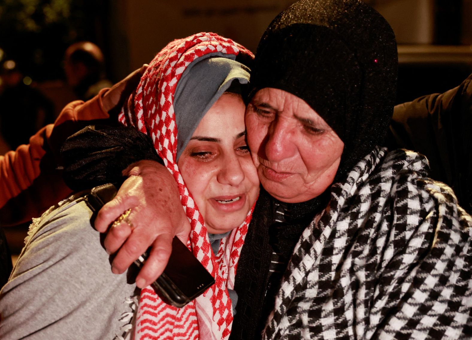 A Palestinian prisoner reacts after being released during the truce amid between Hamas and Israel, in Ramallah in the Israeli-occupied West Bank, on November 28.