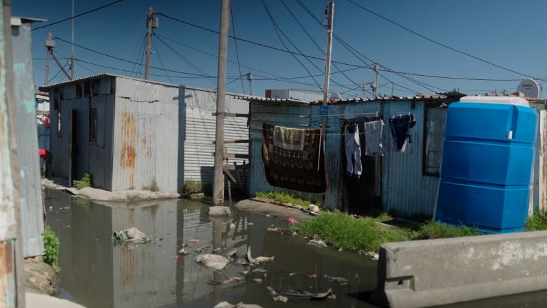 Mpahlwa's latest work has sent him to an informal settlement called Kosovo in Philippi Township, just outside of Cape Town. The project calls for the relocation of around 15,000 people from unsafe shacks like these into more stable, affordable housing. 